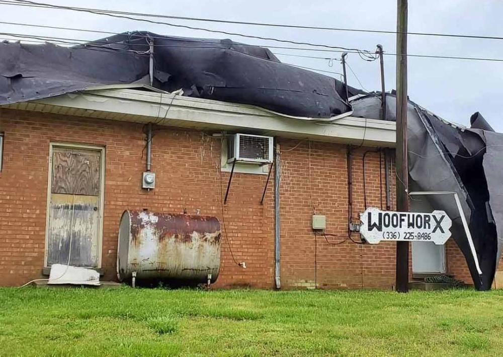 WoofworX Pet Grooming building has the roof ripped off