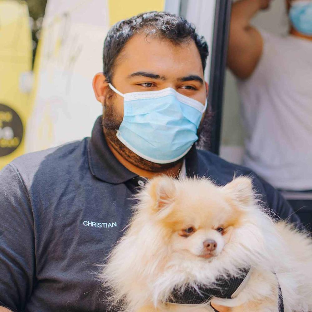 Christian Toraya, groomer from Bark and Lather Mobile Dog Grooming Spa