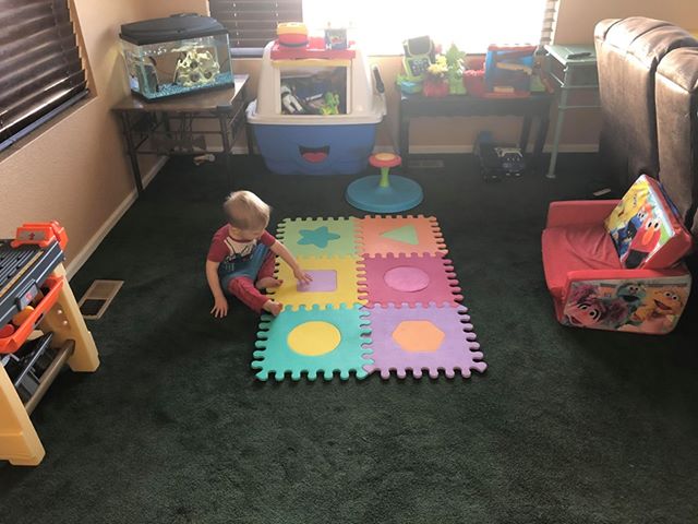 Sara's son back at home, playing with his favorite toys