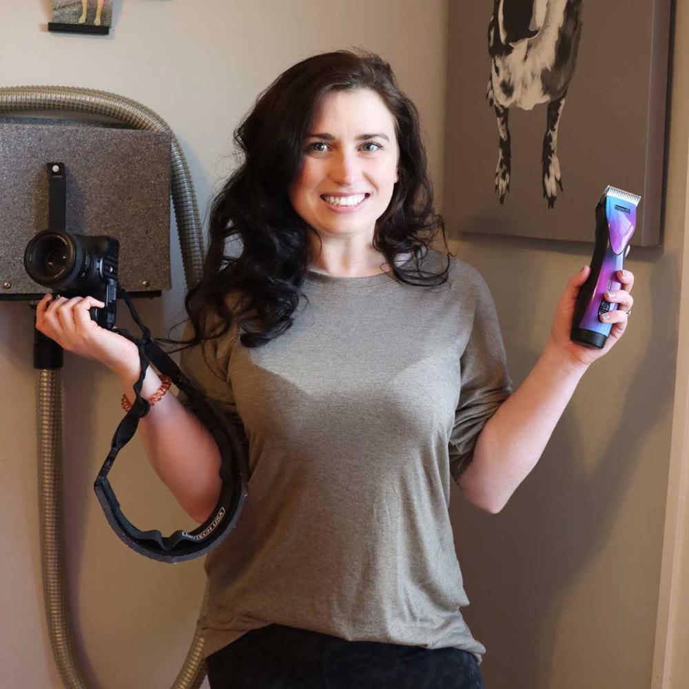 Scottie Strain, a Dog Groomer, equipped with her Camera and her Andis Pulse ZR Clipper