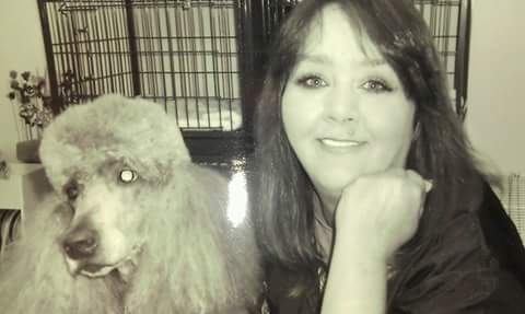 Groomer Sherri Klose and her dog