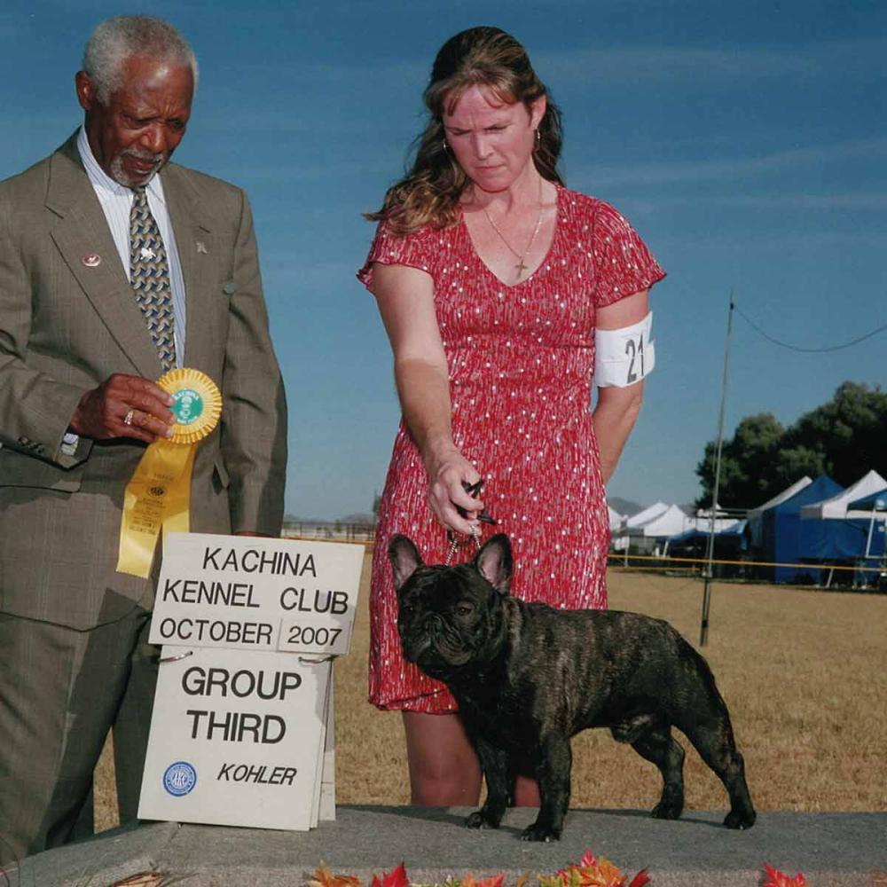 Nancy wins showing her Frenchie Parker